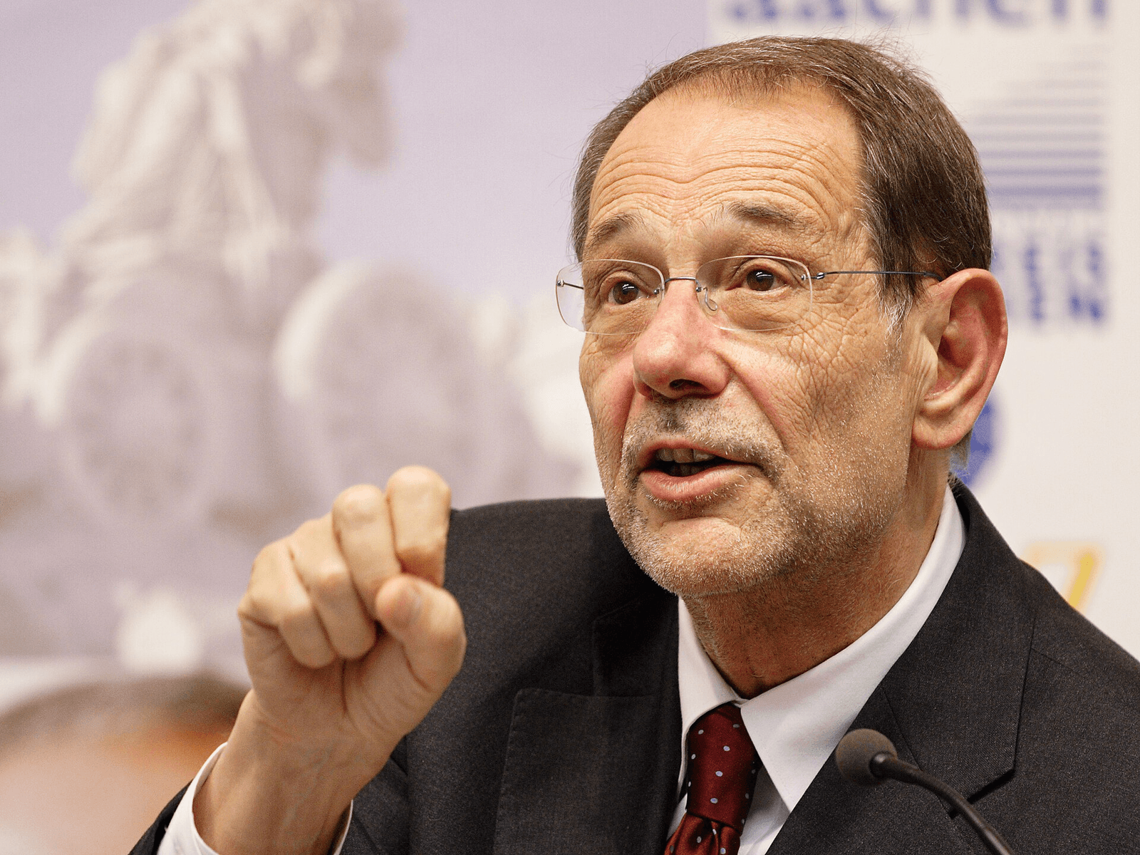 This image shows Dr. Javier Solana . He is the High Representative for the Common Foreign and Security Policy (CFSP) and the Secretary-General of both the Council of the European Union (EU) and the Western European Union (WEU). This photograph shows him as he is discussing with students of the renownend Aachen University (RWTH), one day before receiving the International Charlemagne Prize of the city of Aachen (Karlspreis) . According to the legal situation in Germany, the university of Aachen was asked for permission before taking the photograph.