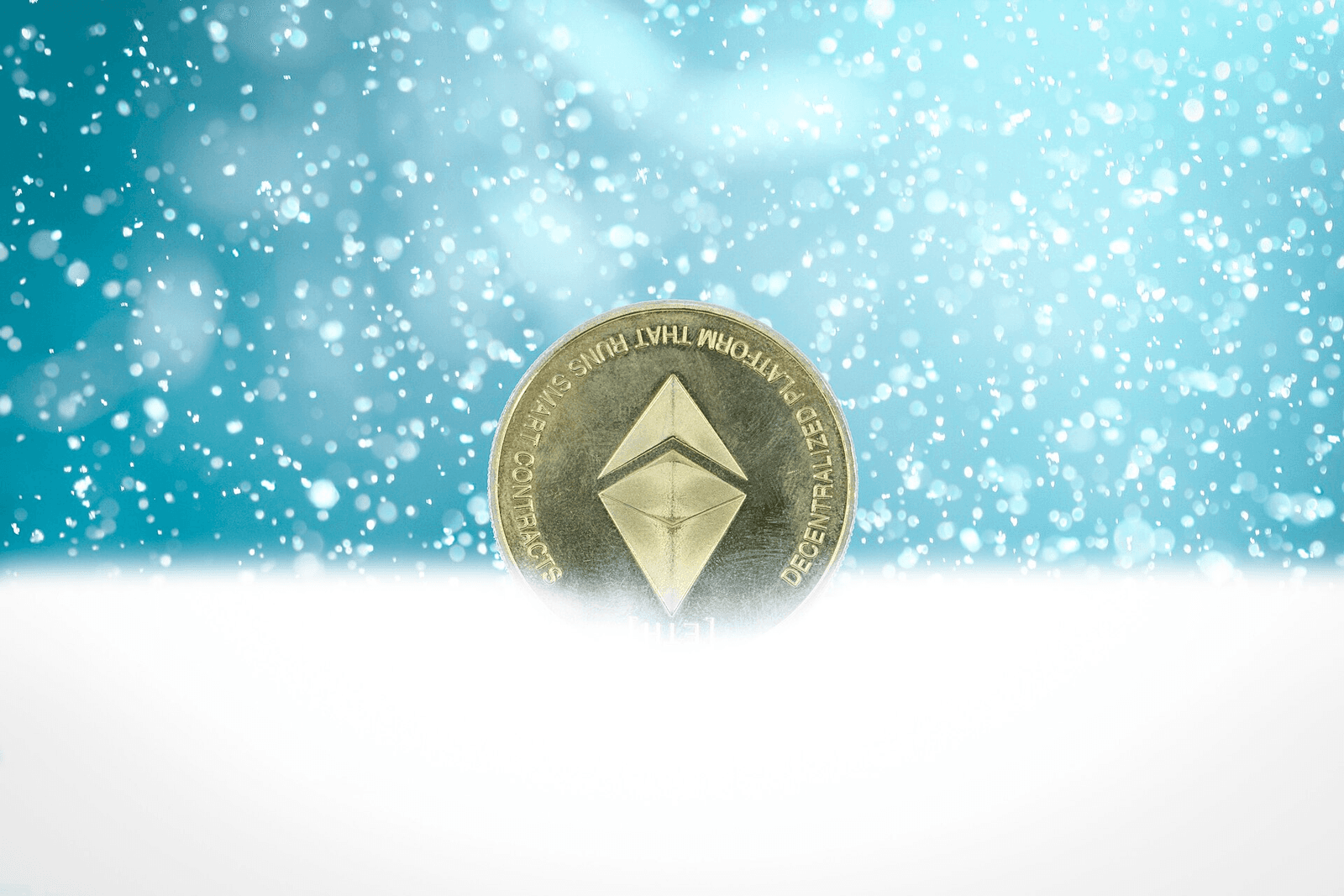This graphic image shows an Ethereum cryptocurrency medallion in the snow. It's an image used to represent the concept of a Crypto Winter when crypto markets cool and currencies such as Ethereum drop in value. This image is available to you under the Creative Commons Attribution licensing. In other words, we welcome you to use the image, in commercial content or otherwise, as long as attribution is provided in the form of a link to www.bybit.com/ as copyright holders.